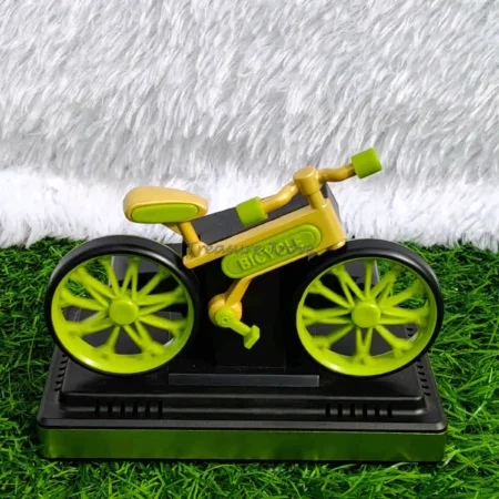 Solar powered rotating bicycle car dashboard decor accessory