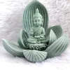 Lotus throne Buddha and Ganesha decorative statue with green stone finish